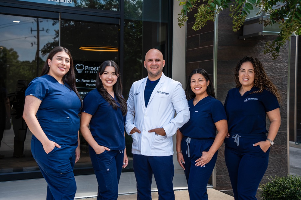 Dr. Rene Gonzalez and the ProsthDent dental team standing outside their Magnolia office